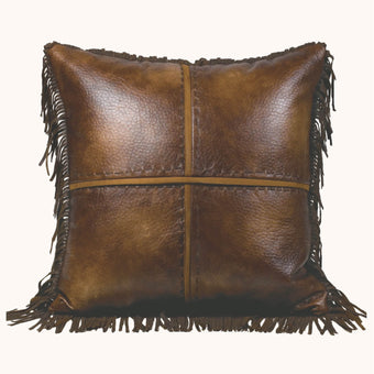 Faux leather accent pillow with fringe